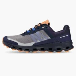 On Running Women's Cloudvista Trail Shoe - Midnight/Copper- Regular (B) 11 On Running Women's Cloudvista Trail Shoe - Midnight/Copper- Regular (B) -Hoka Shop 64.98592 cloudvista fw22 midnight copper w g4